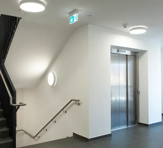 DISCugr im Treppen- & Aufzugsbereich Haus Margarete